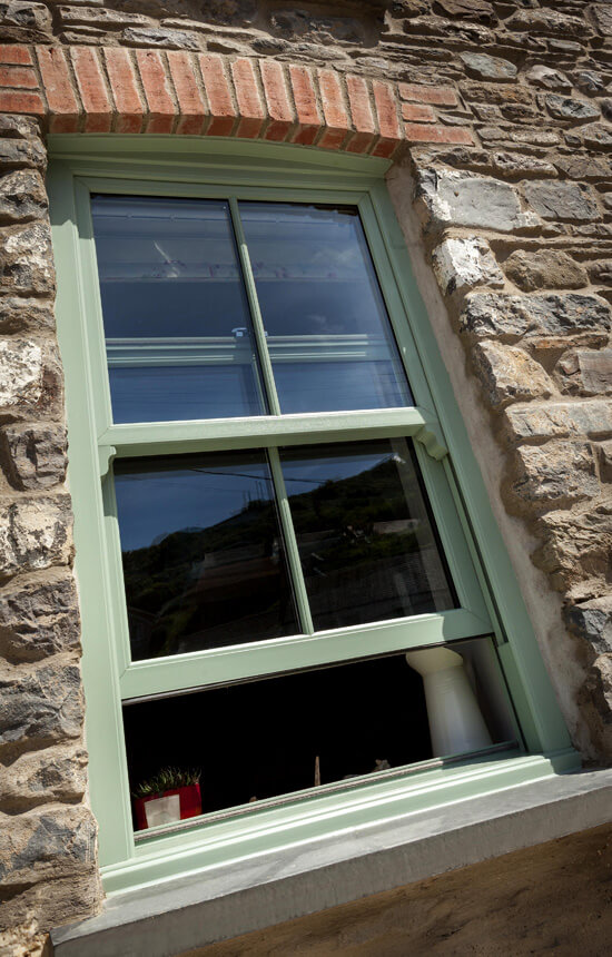 Chartwell green vertical sliding window