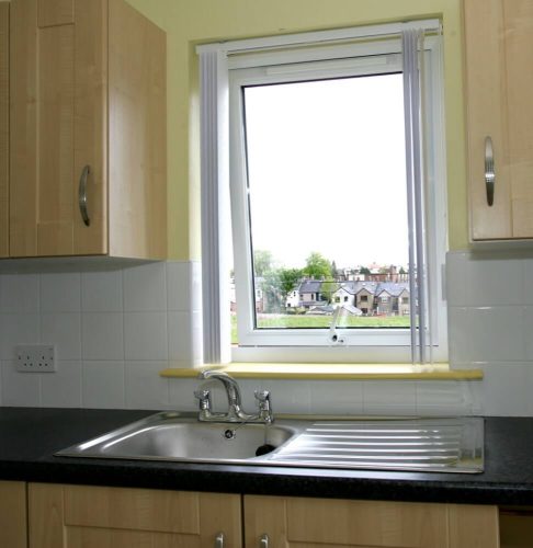 Interior view of small kitchen window above the sink