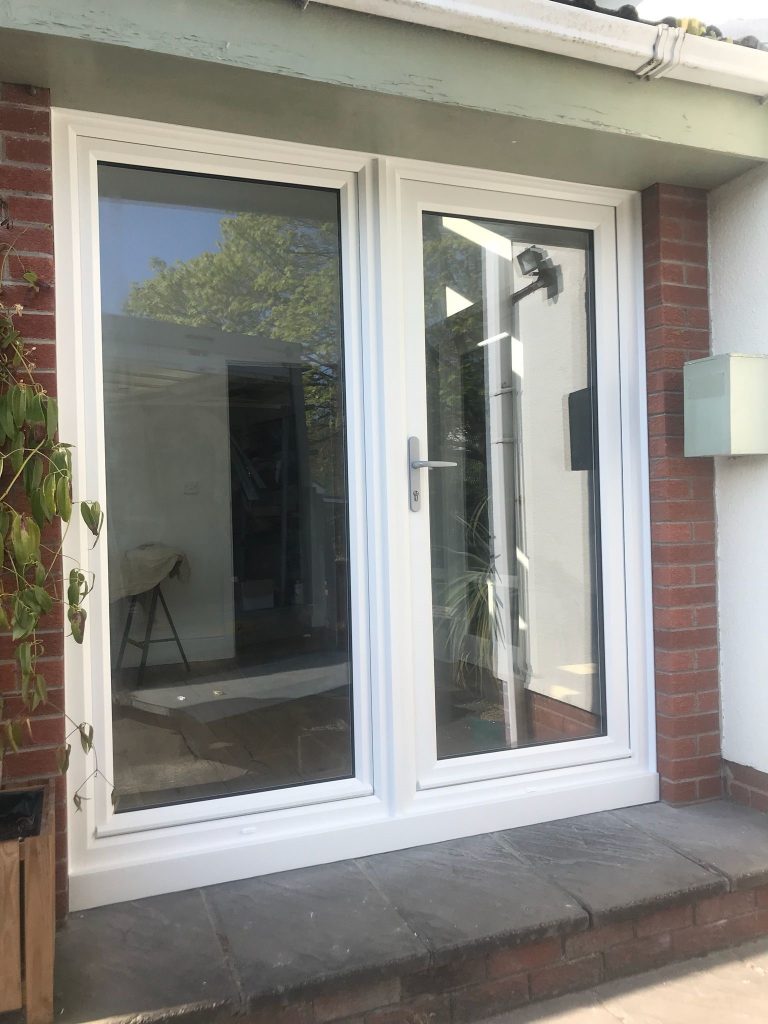 Outside view of White French doors